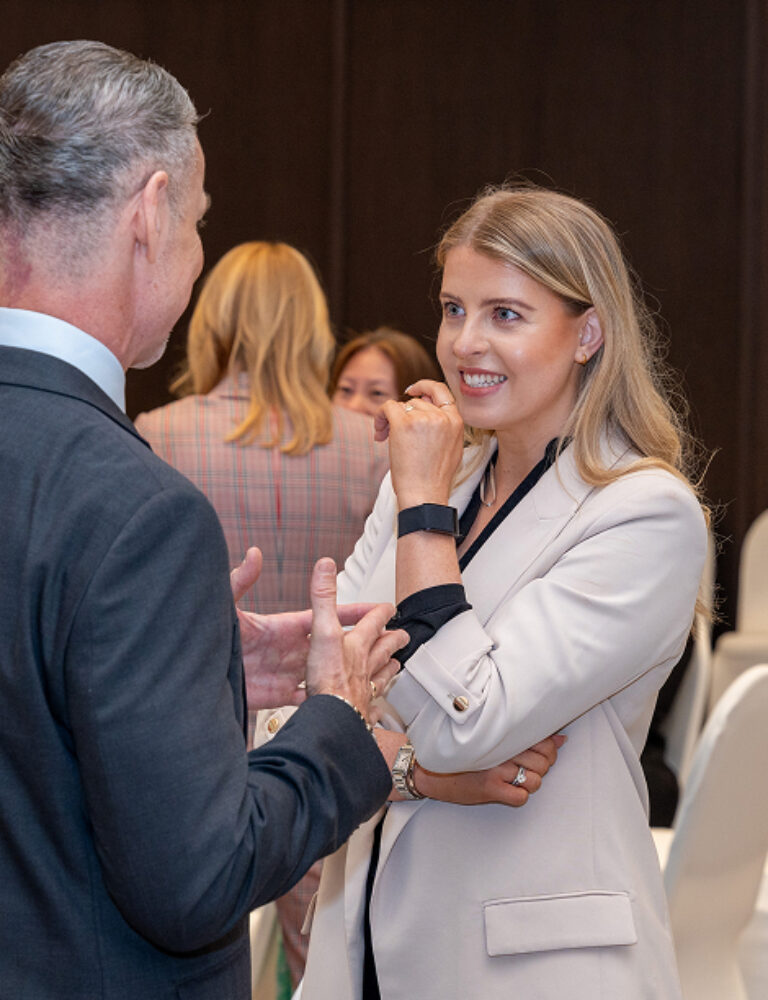 A Member of the IBN in discussion with another member at one of our events